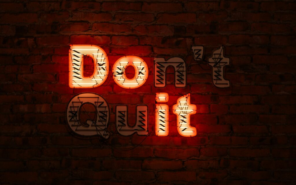 Outsourcing Press Release Distribution is a Game-Changer for PR Professionals 5 A light up letter showing DO IT on a bricked wall