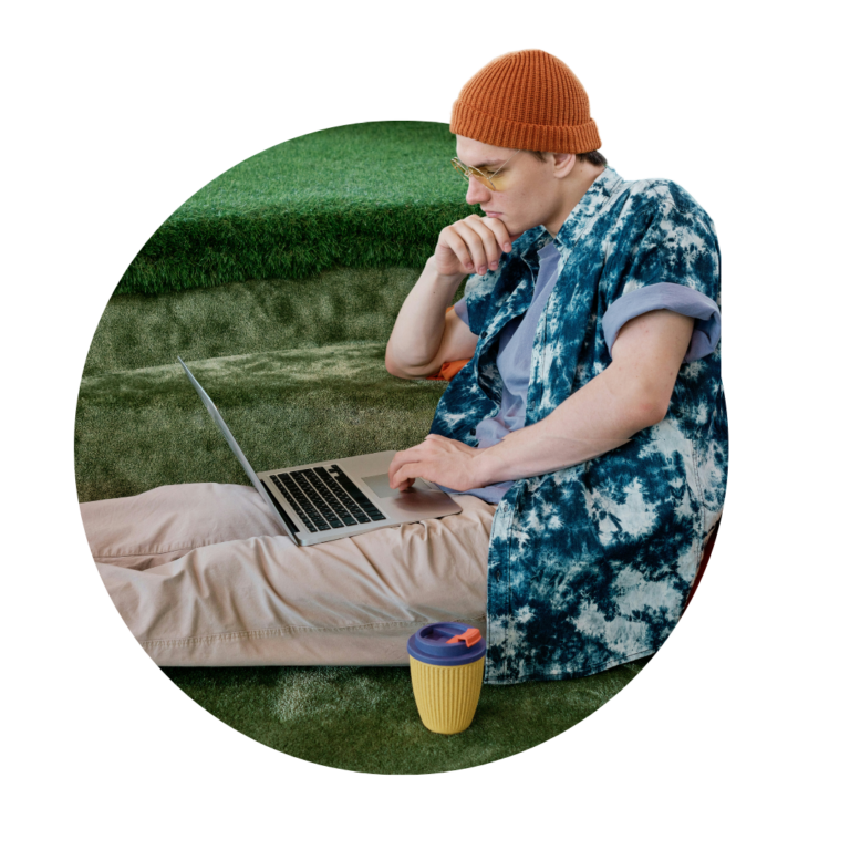 Frequently Asked Questions 1 Editorial Guidelines. A person sat on the floor looking at their computer